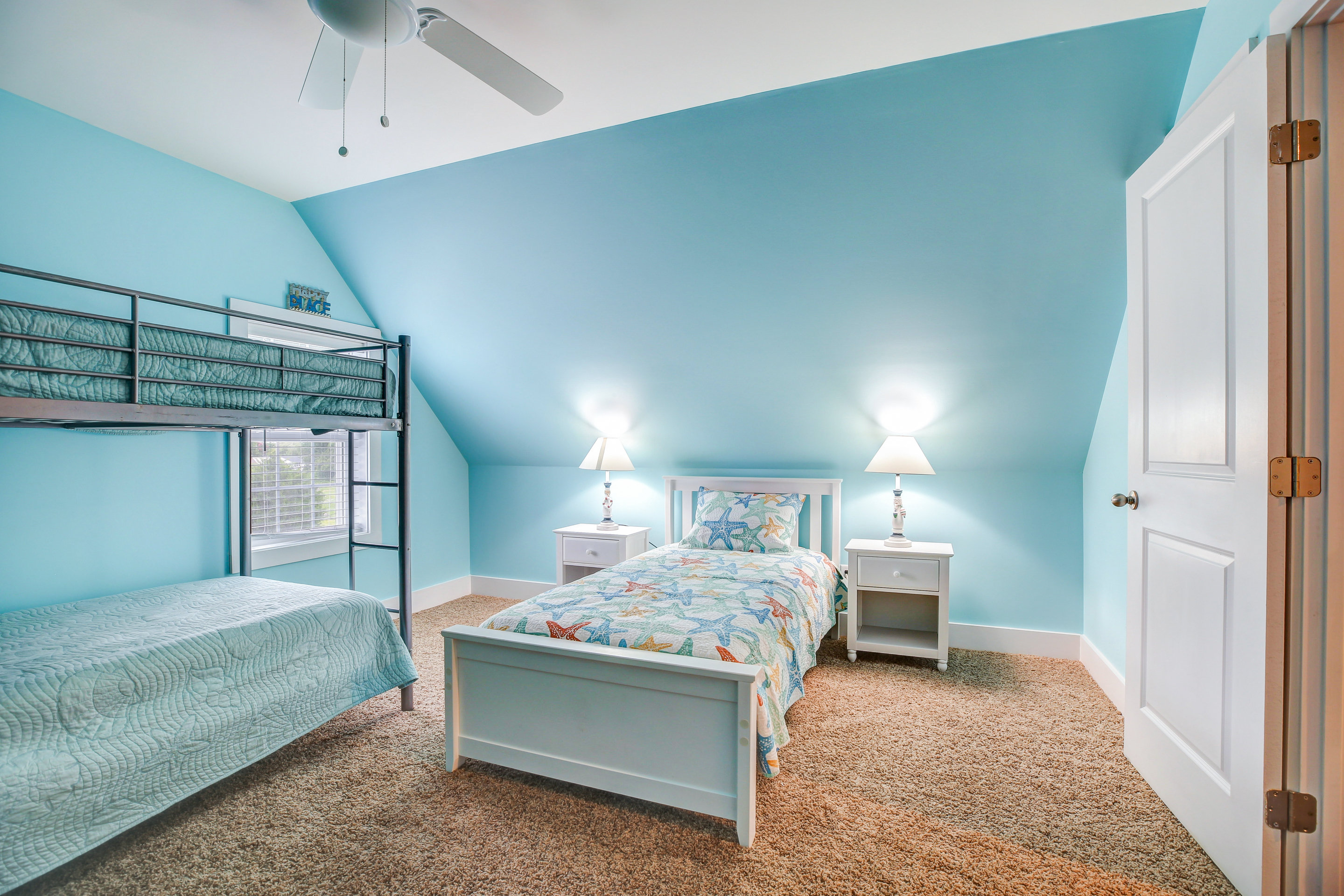 Upstairs, Bedroom 2 has 4 Twins and tons of space.