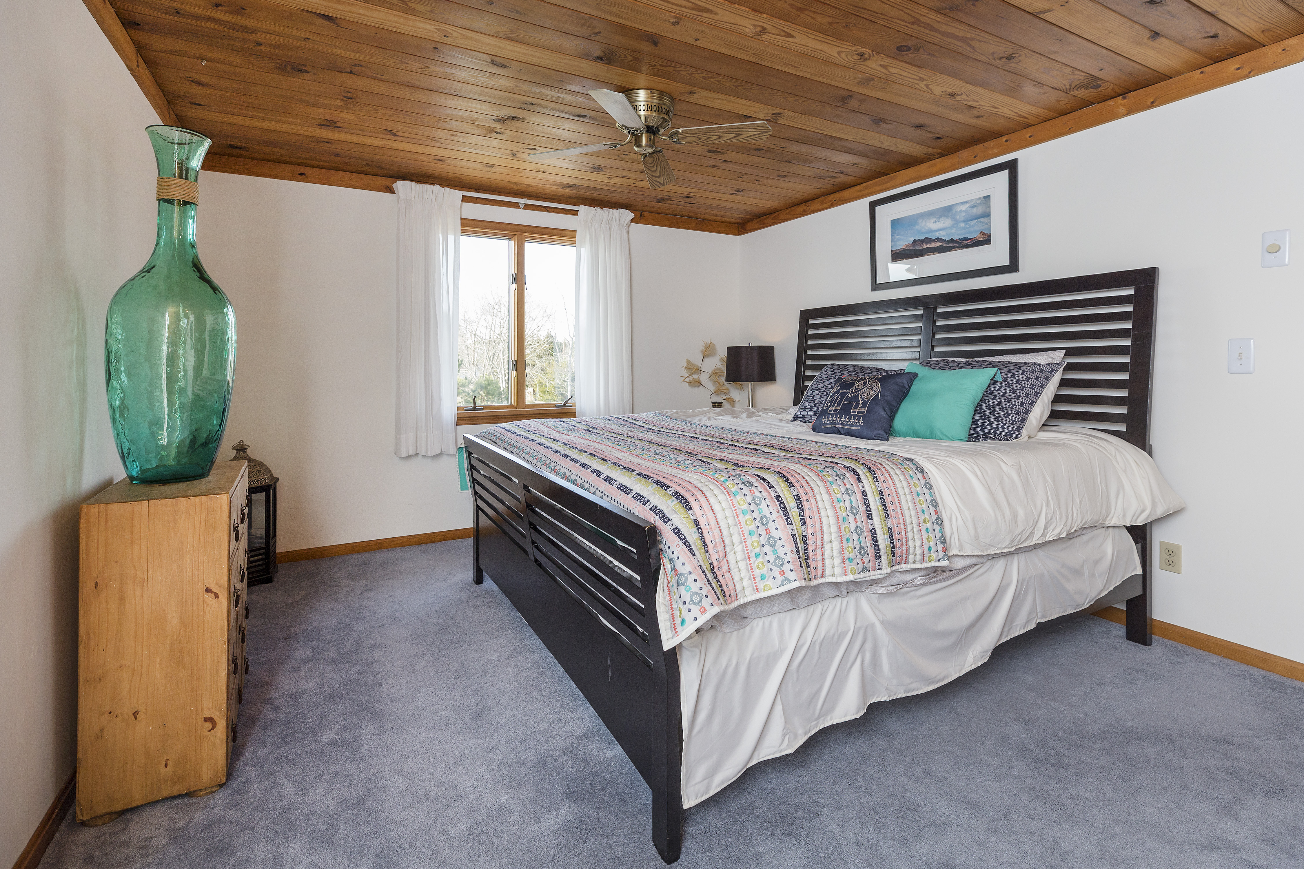 The breathtaking Master Bedroom upstairs has a King Bed, Sitting Area, and Private Balcony.