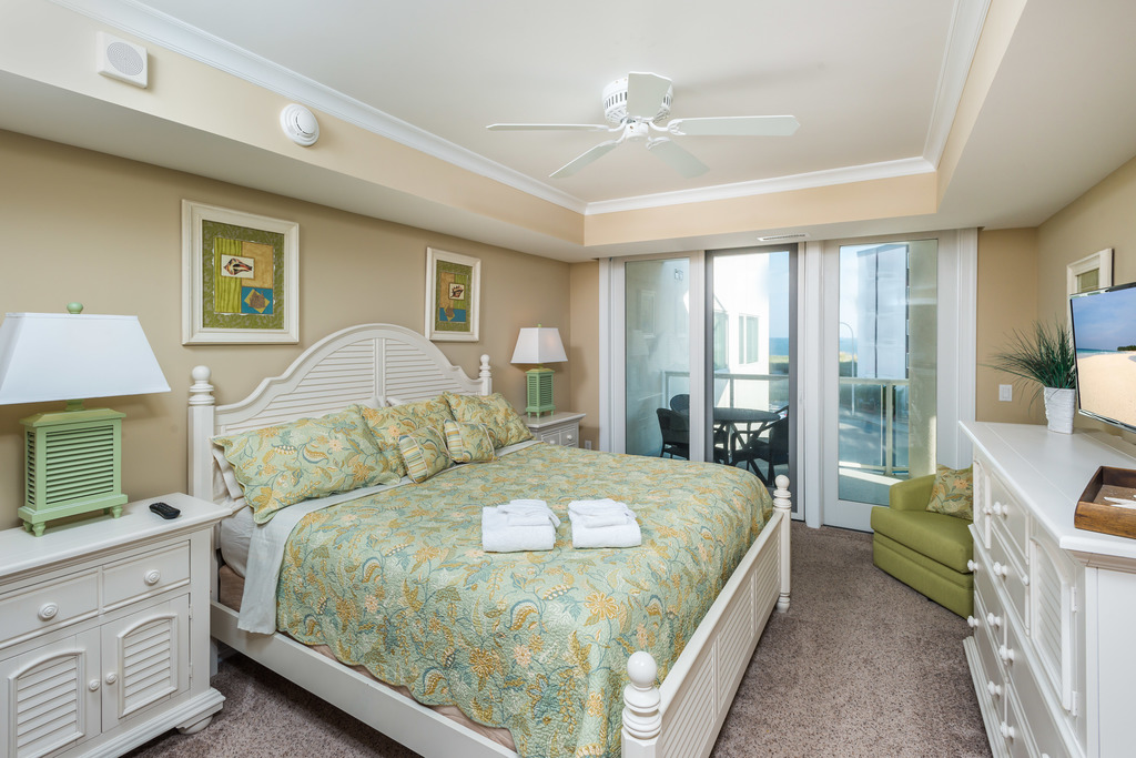 Primary Bedroom with access to Balcony with Ocean Views.