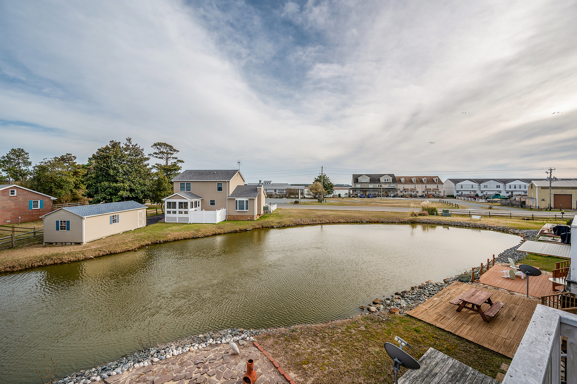 Watch Herons and Egrets fish for their morning meal - and there's the Chincoteague Channel!