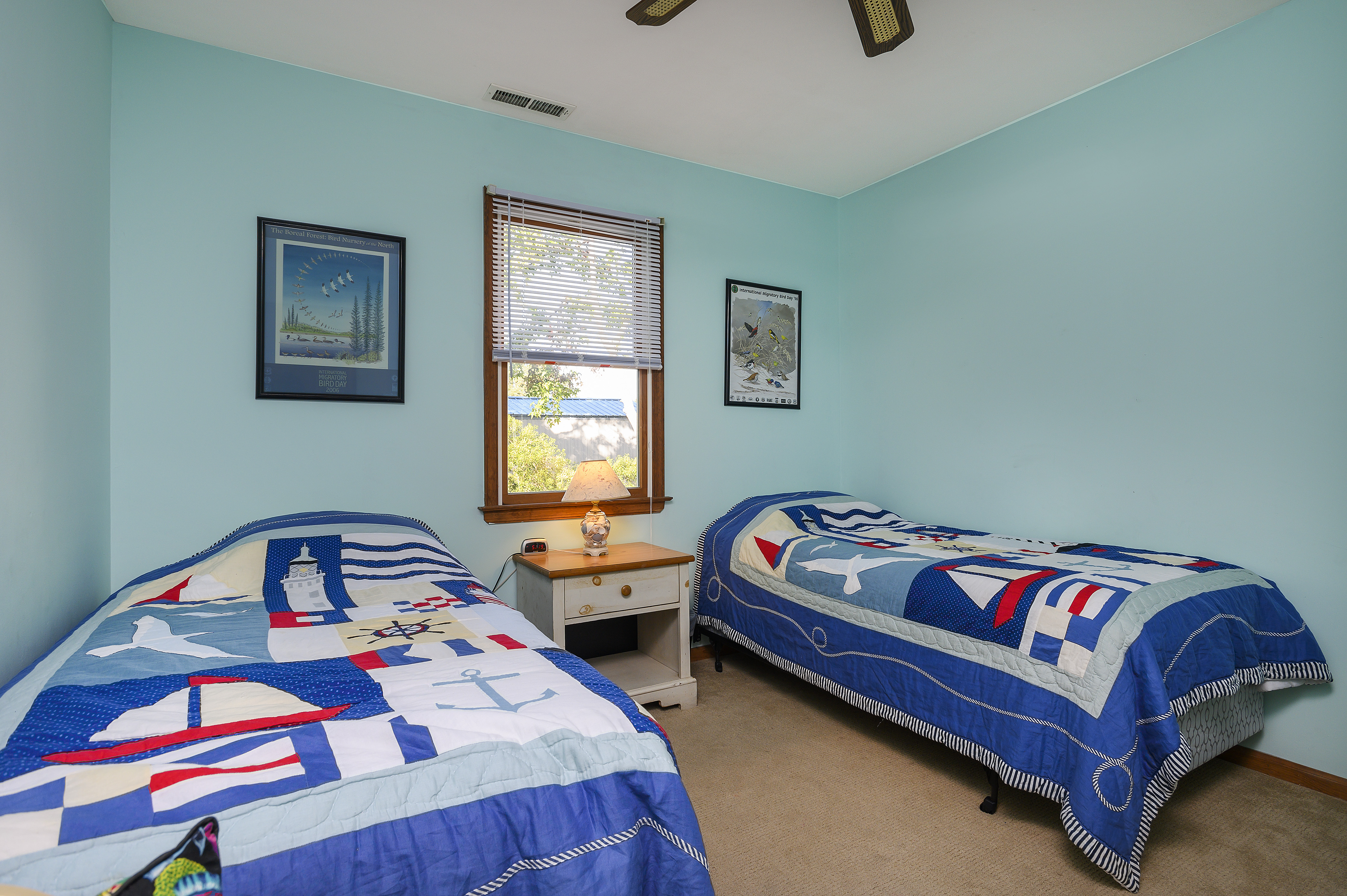 Also downstairs is Bedroom 2 with 2 Twins and a fun Lighthouse Theme.