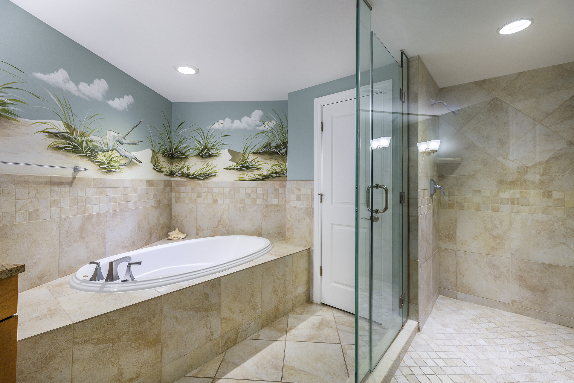 The Primary Bath with Custom Hand-Painted Murals will leave you speechless.