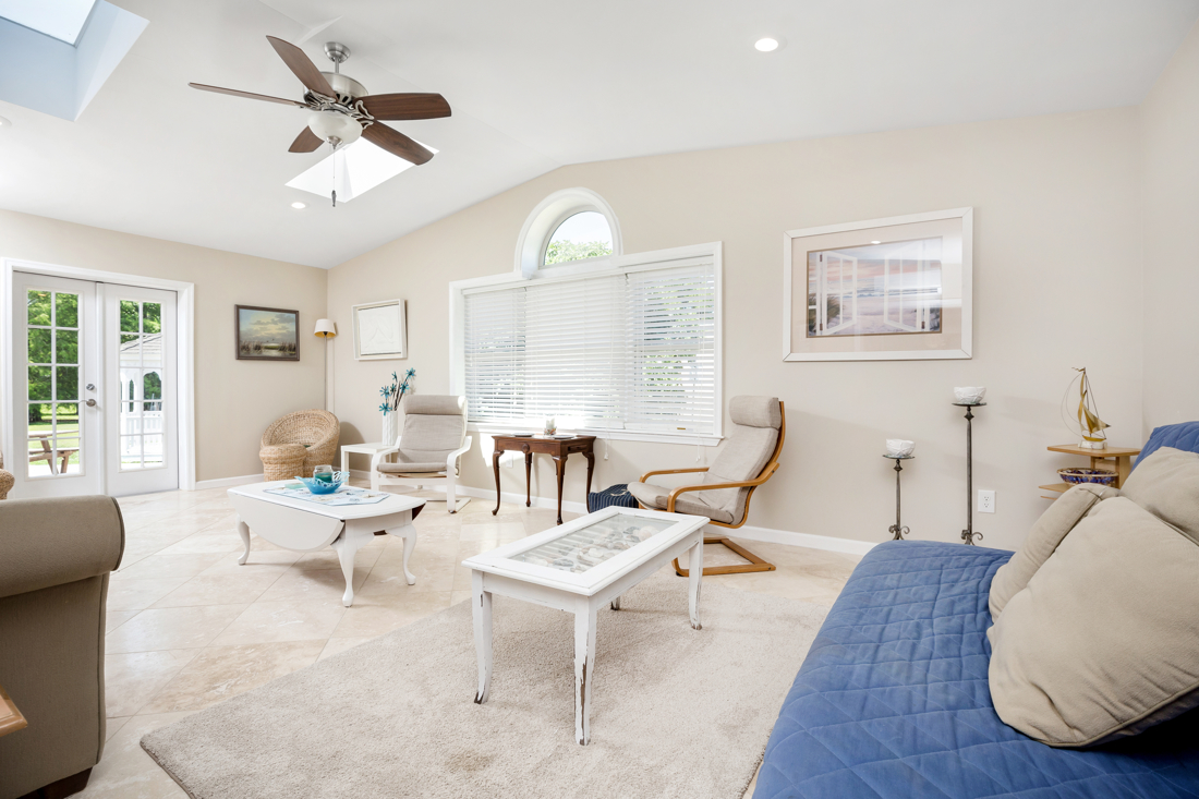 Open the French Doors and relax in the lush backyard.