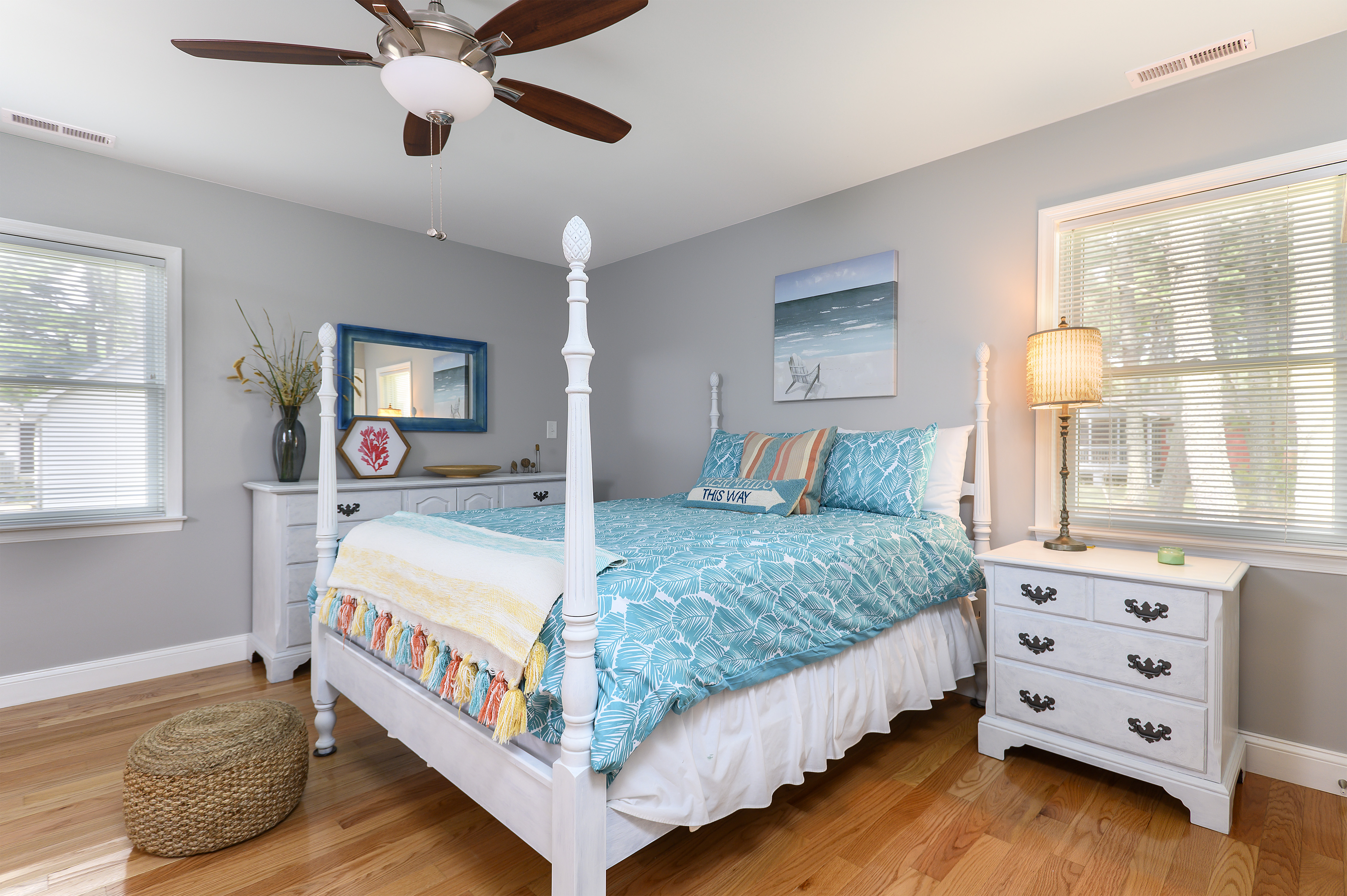 The stunning Master Bedroom has colors of Sea Glass & is gorgeously furnished.