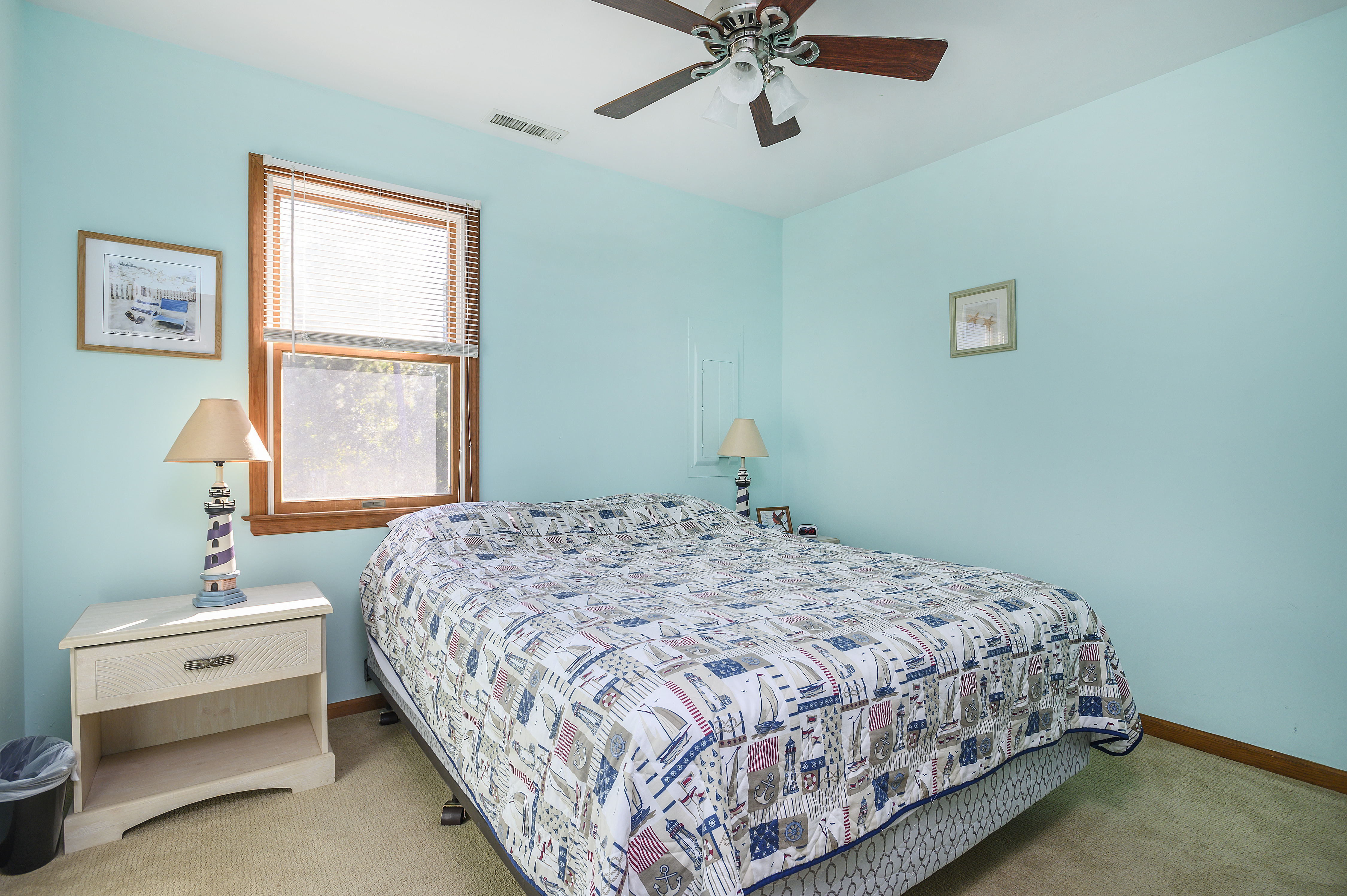 Downstairs, Bedroom 1 has a comfy Queen Bed.