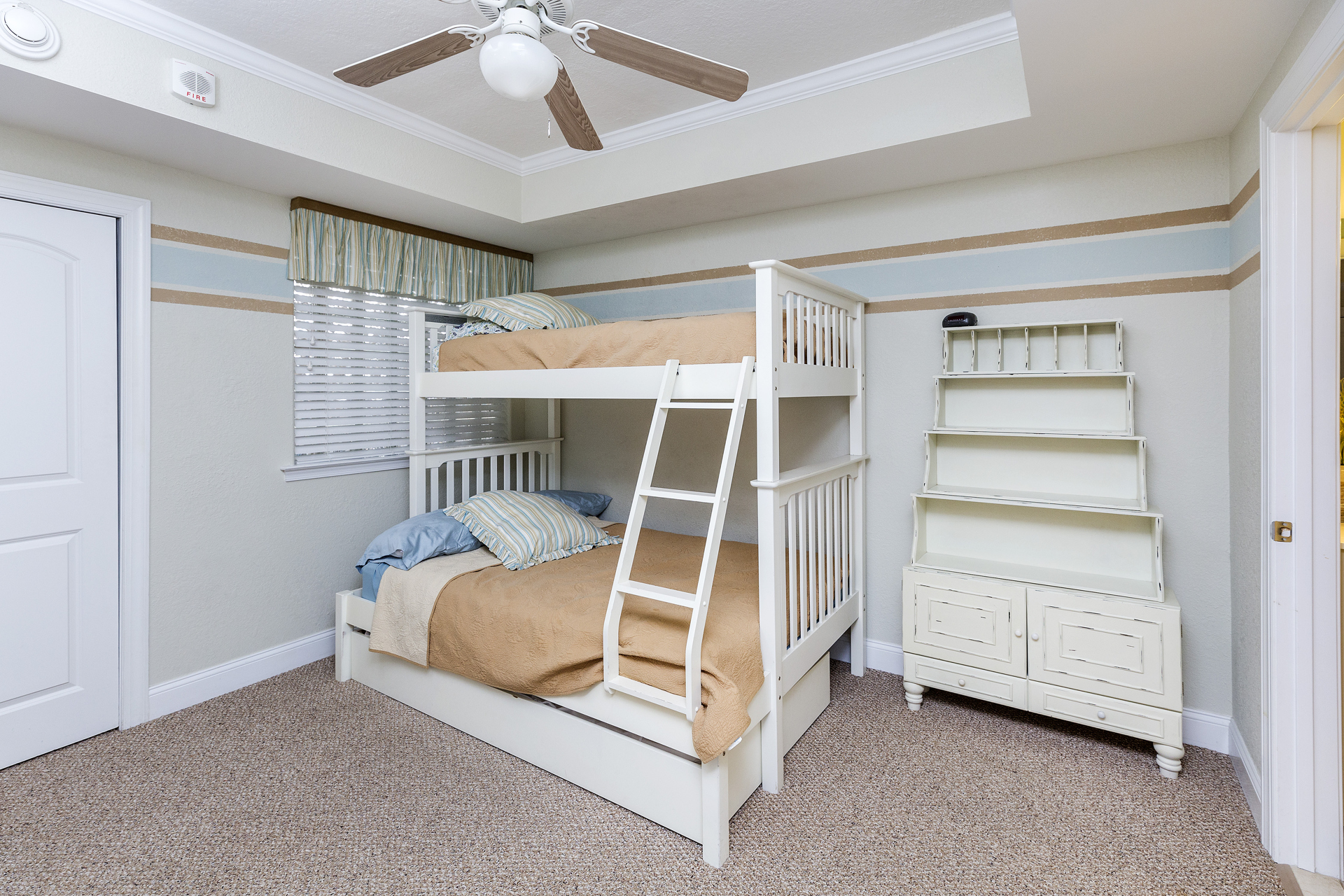 Bedroom 3 is perfect for the kids with a Pyramid Bunk with Twin Trundle & Flat Screen TV.