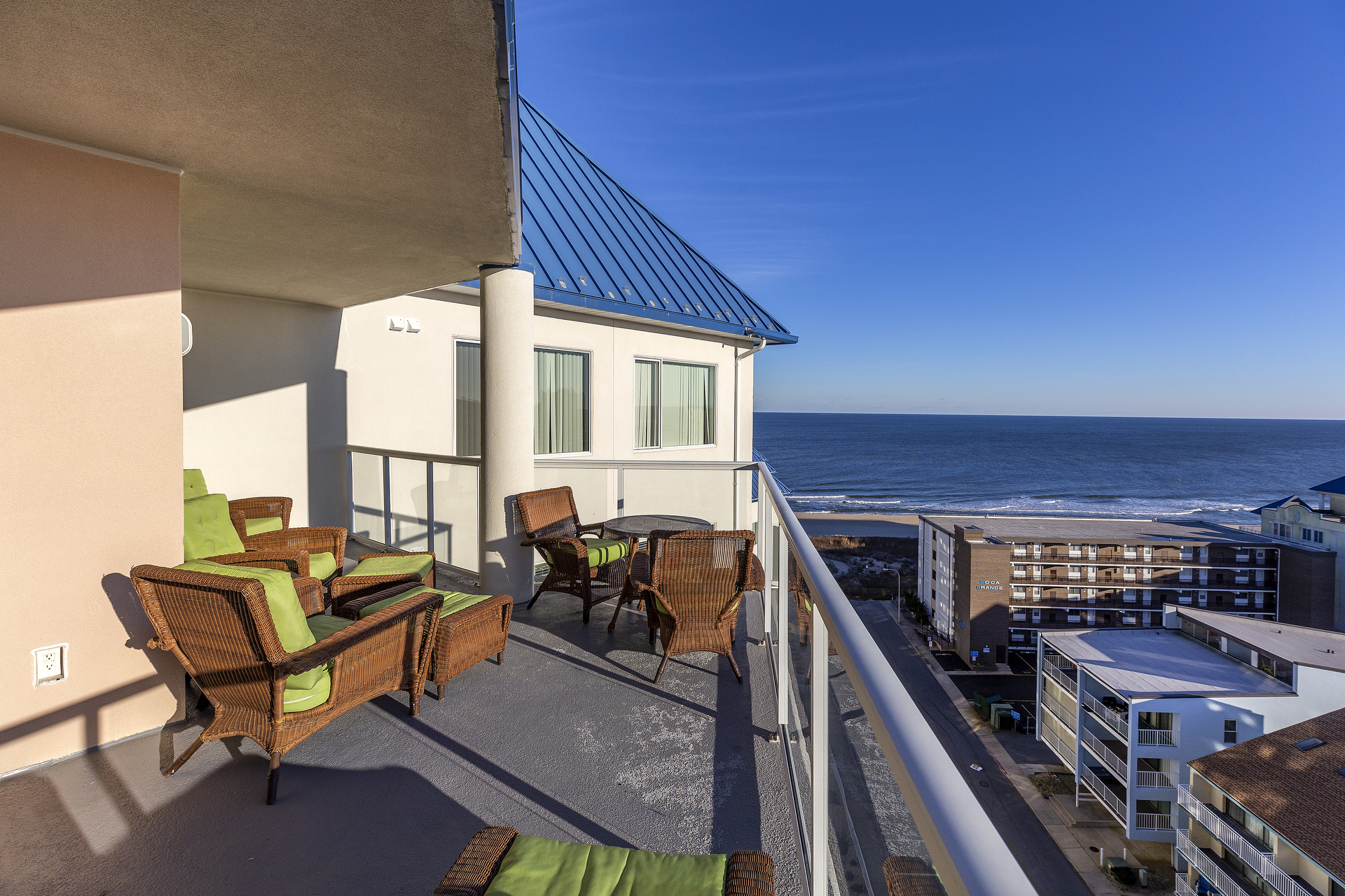 Sink into the comfy High-end Wicker furniture after a day at the Beach.