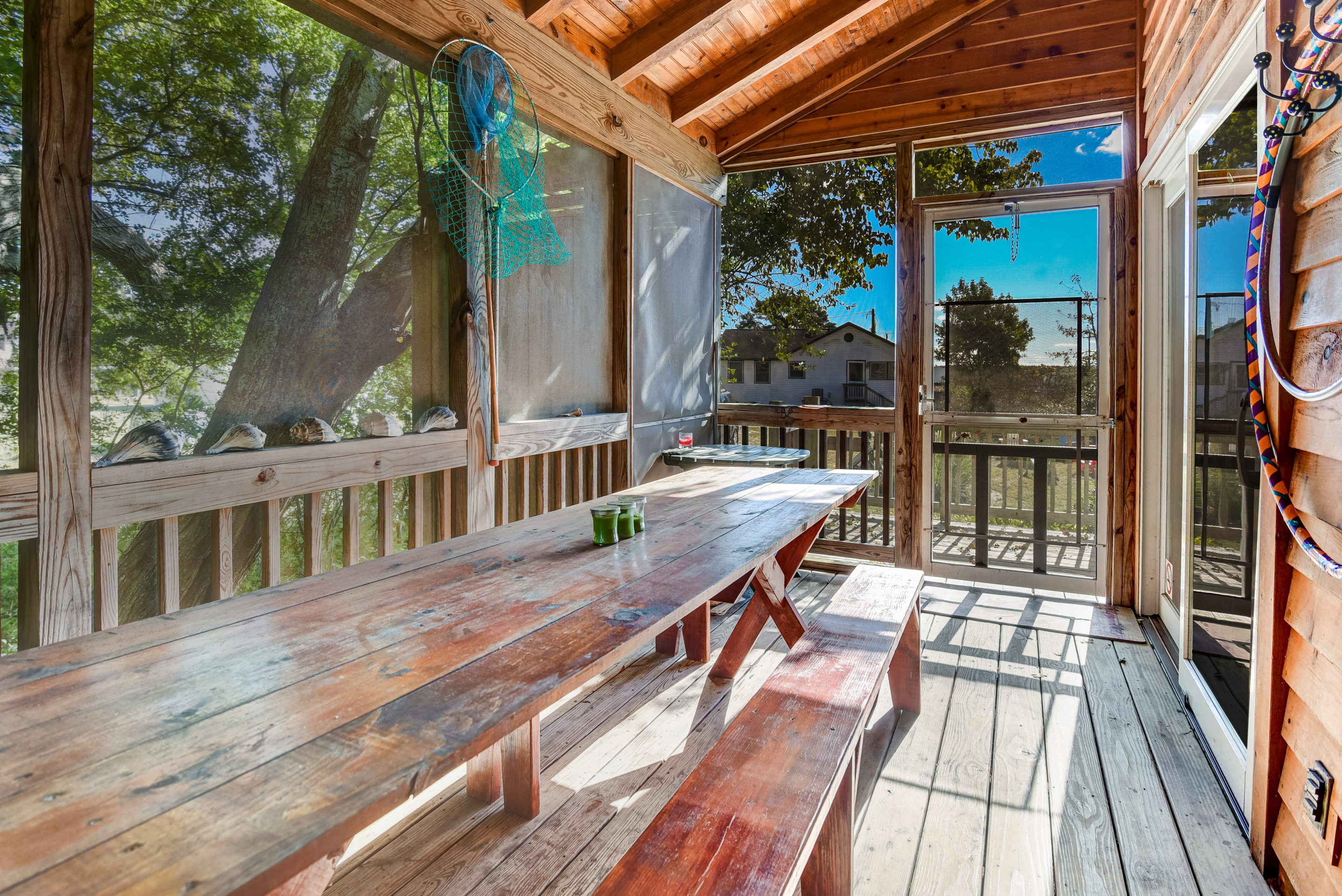 Take in those salty sweet breezes while relaxing on the Screened Porch.