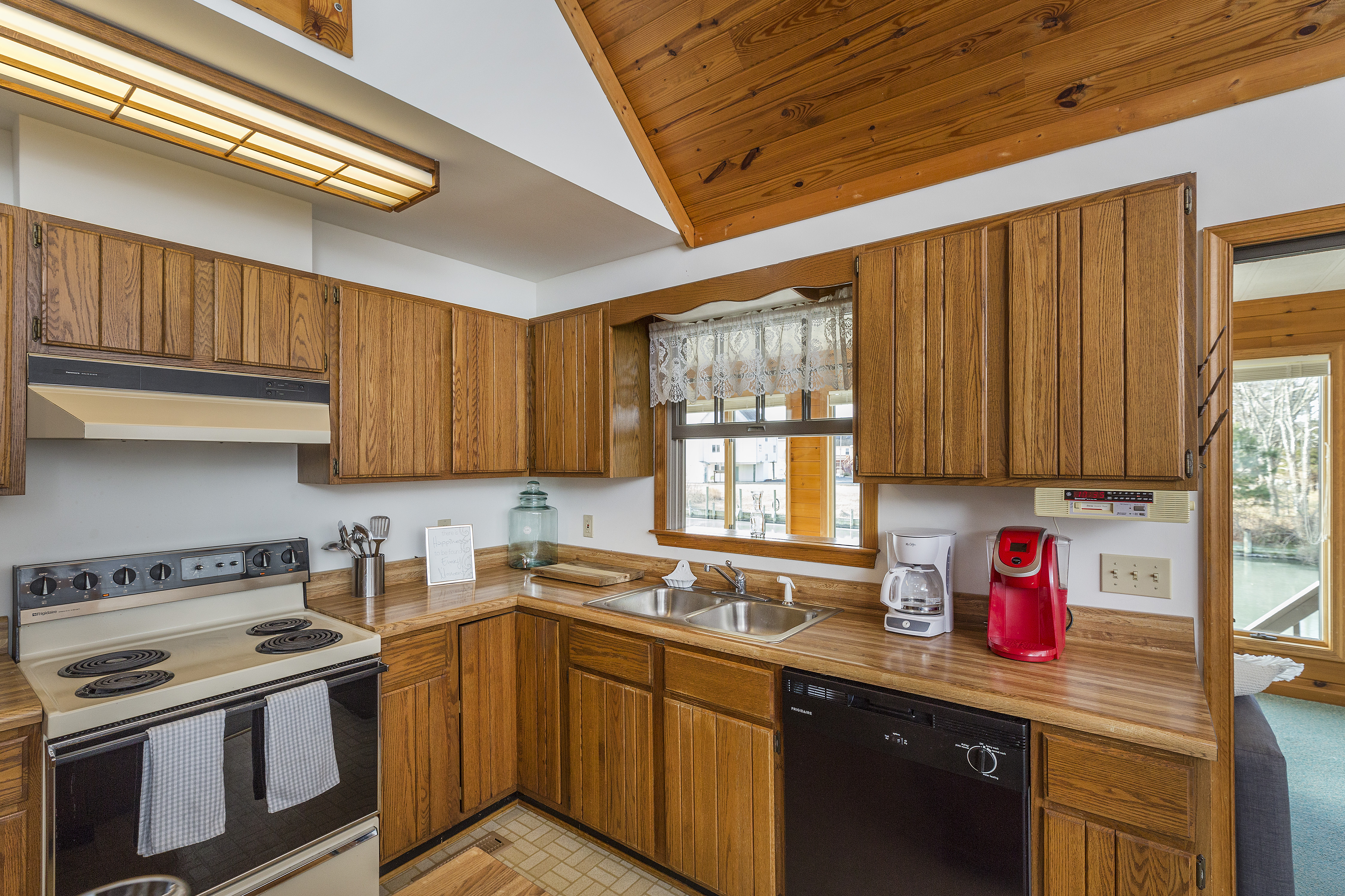 The Kitchen overlooks the gorgeous Waterfront Sunroom.