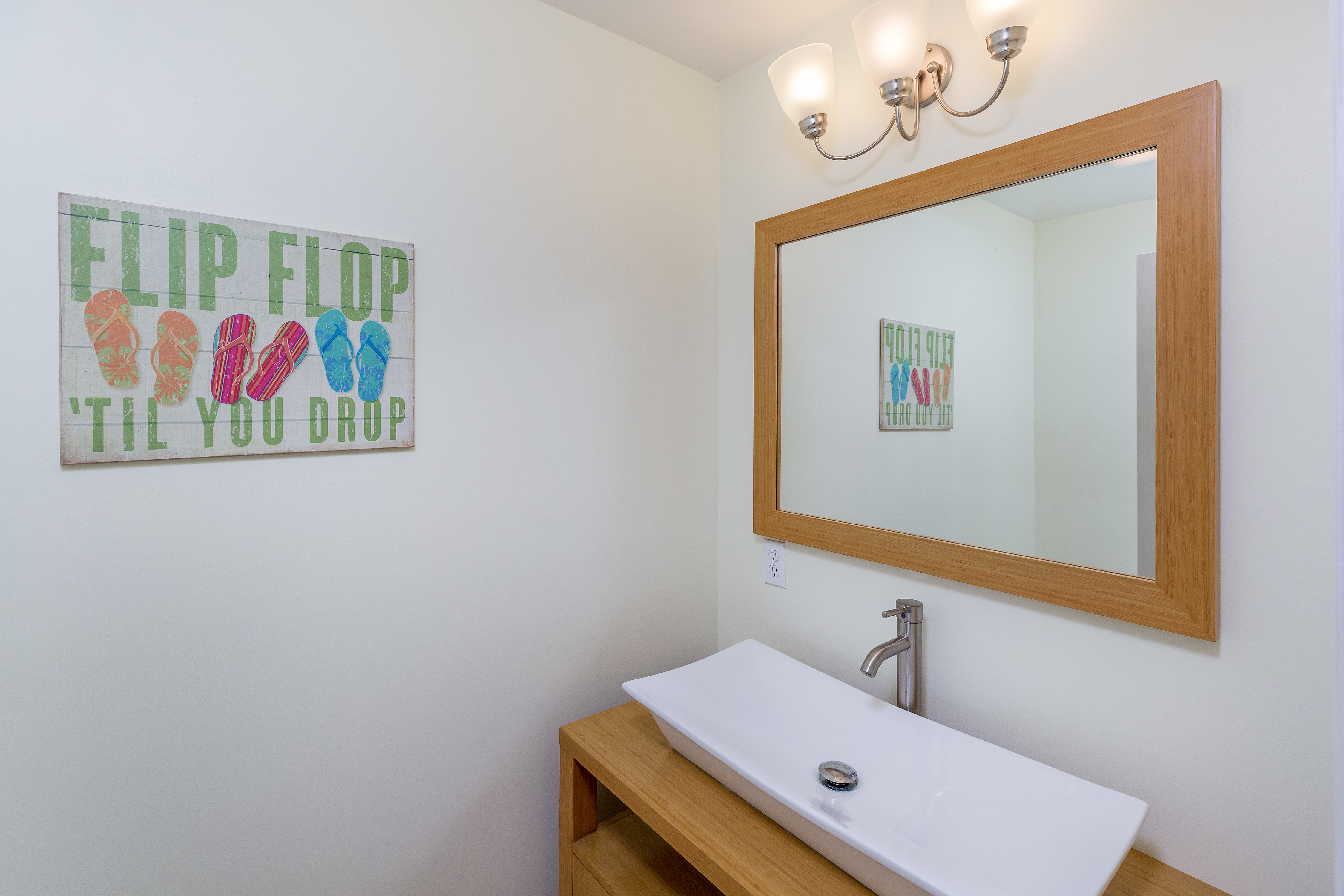 Lovely Half Bath just off of Living Area.