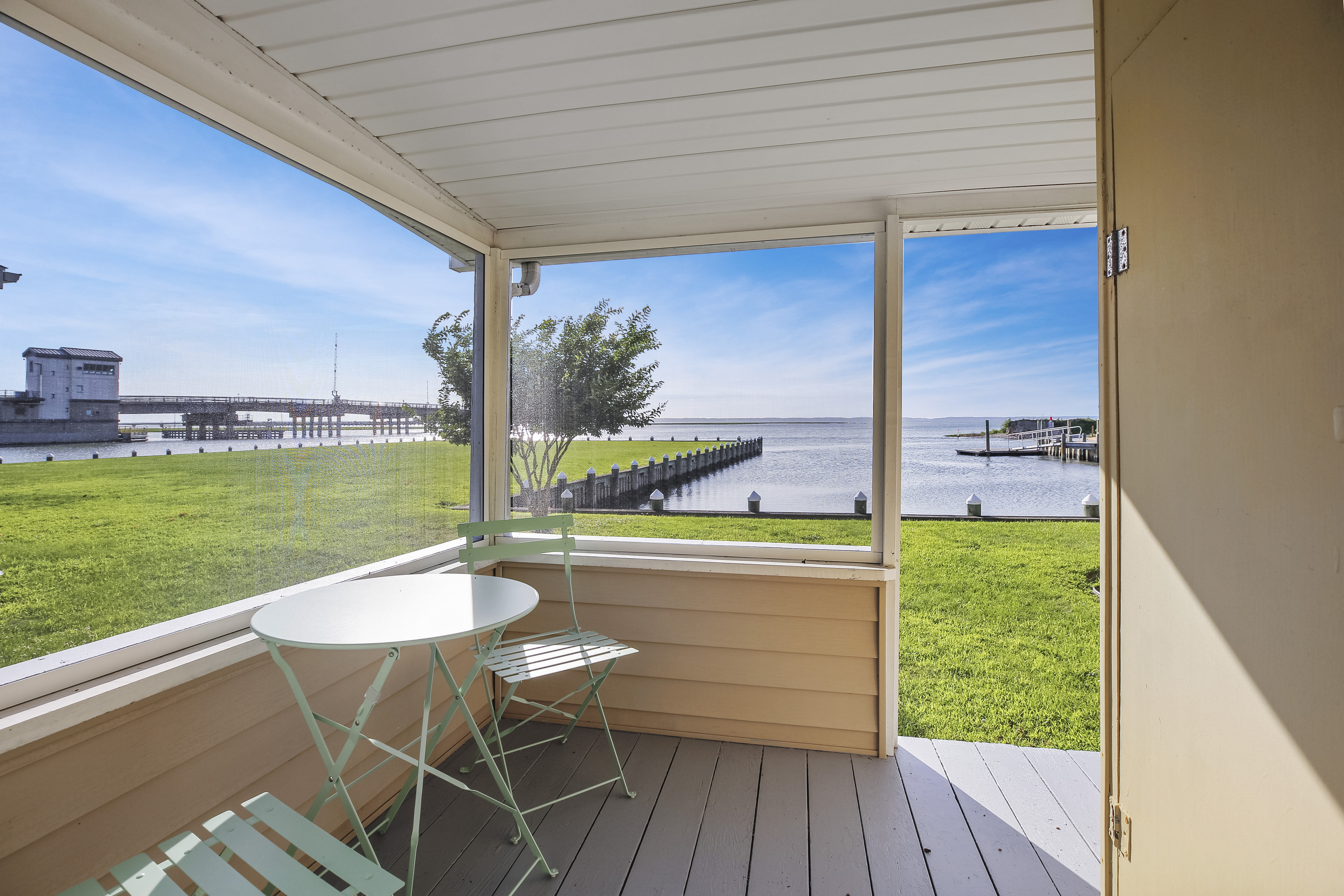 Take in the most fabulous Sunsets from the Waterfront Screened Porch.