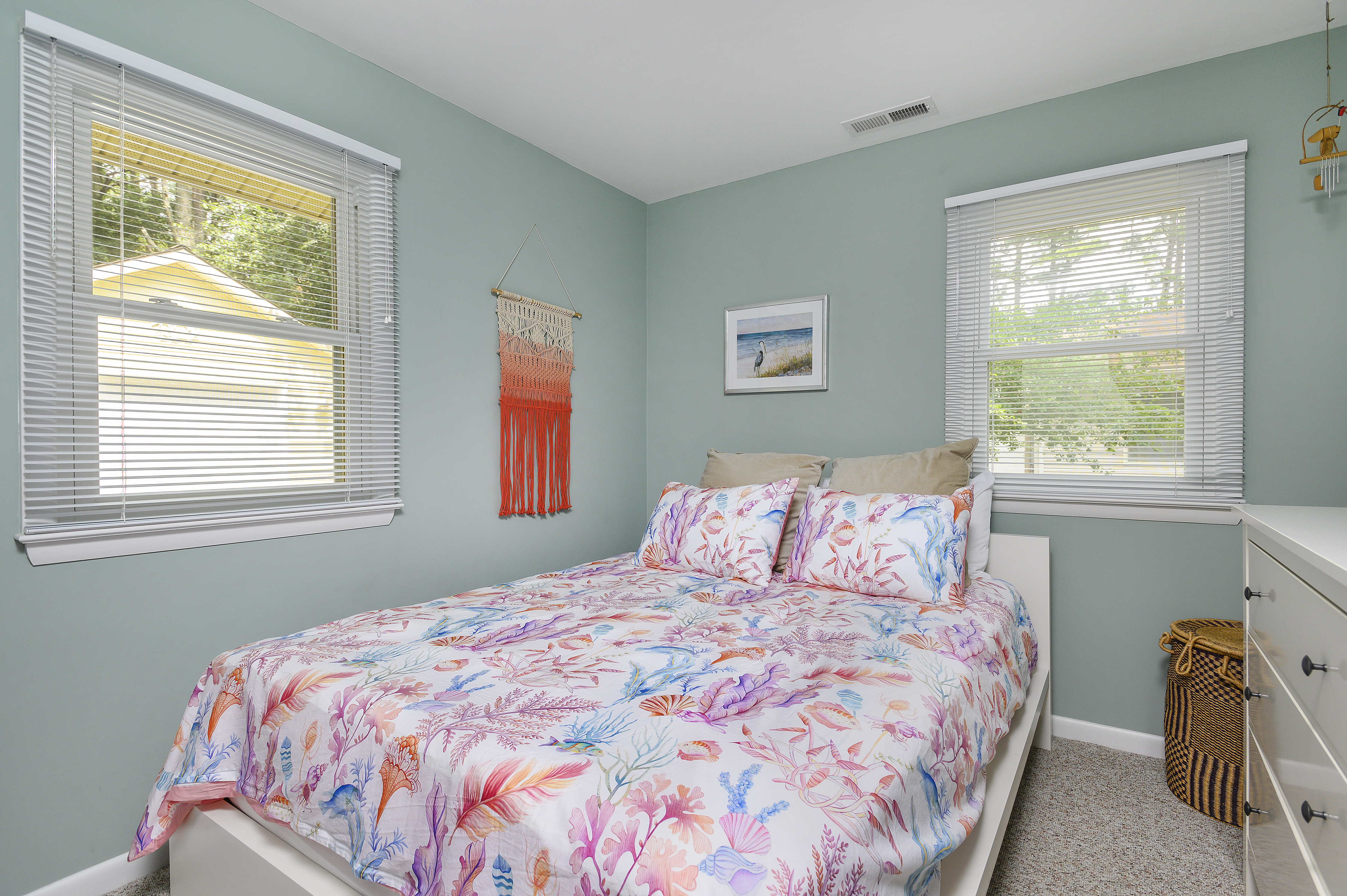 Bedroom 3, across the Hall, is equally welcoming.