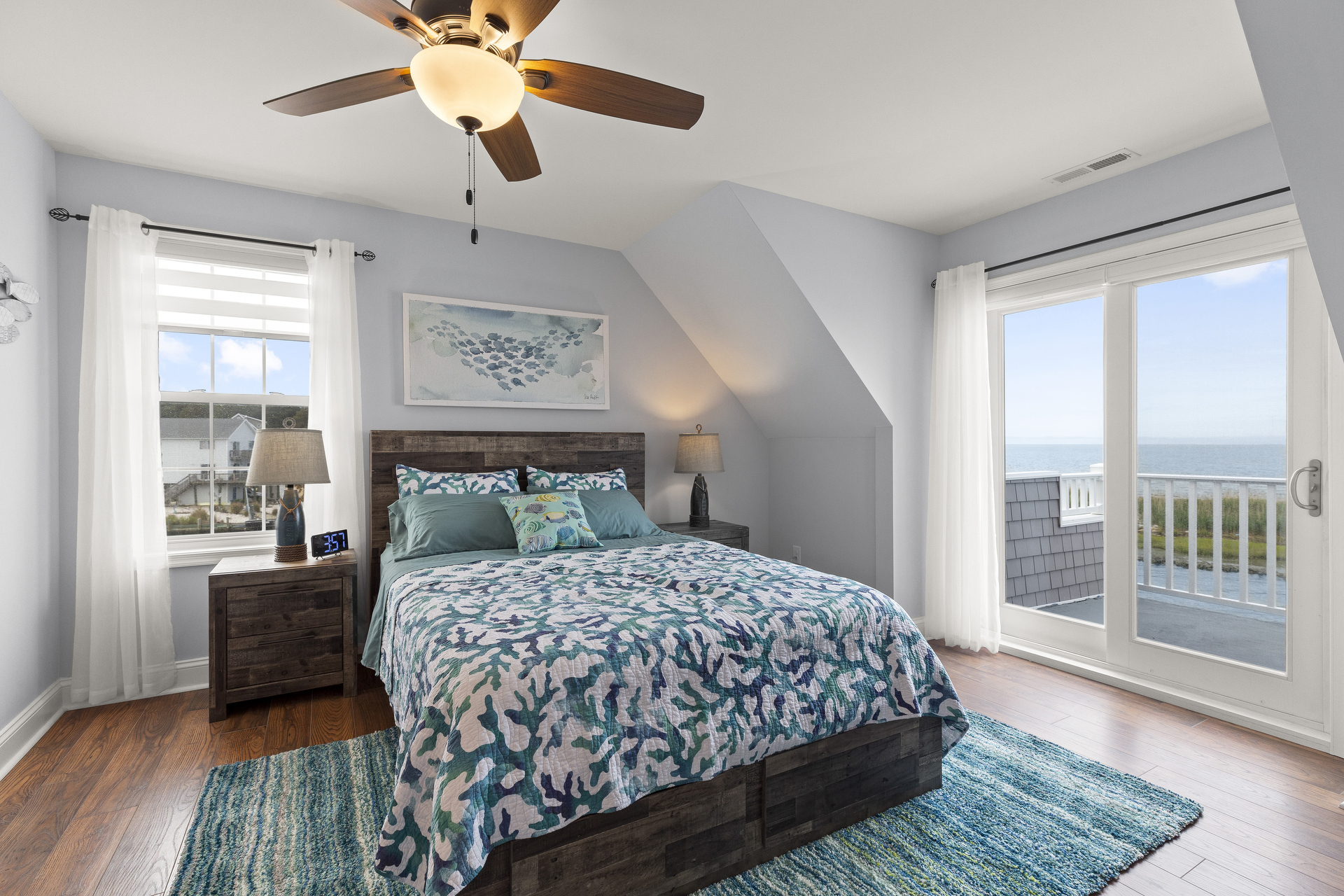 Bedroom 2 has a Queen and Colors of Sand and Sea.