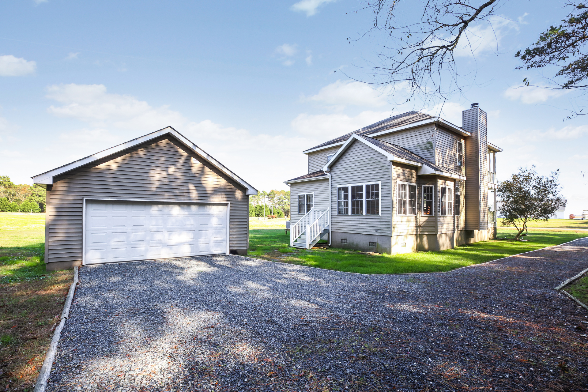 Parking for 3 cars and even your boat in the spacious Driveway behind the home.