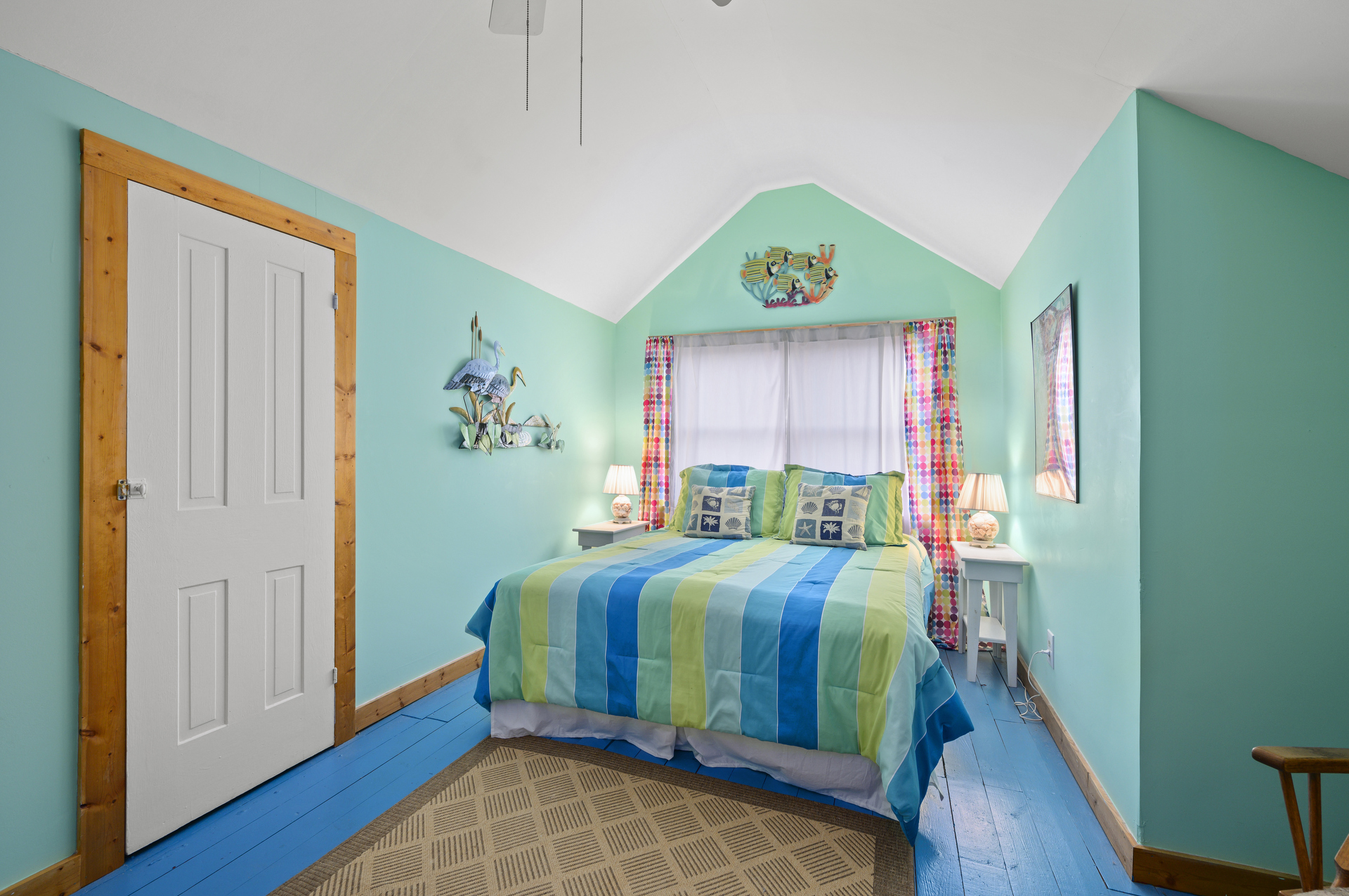 Wandering upstairs, Bedroom 2 has a Queen Bed.