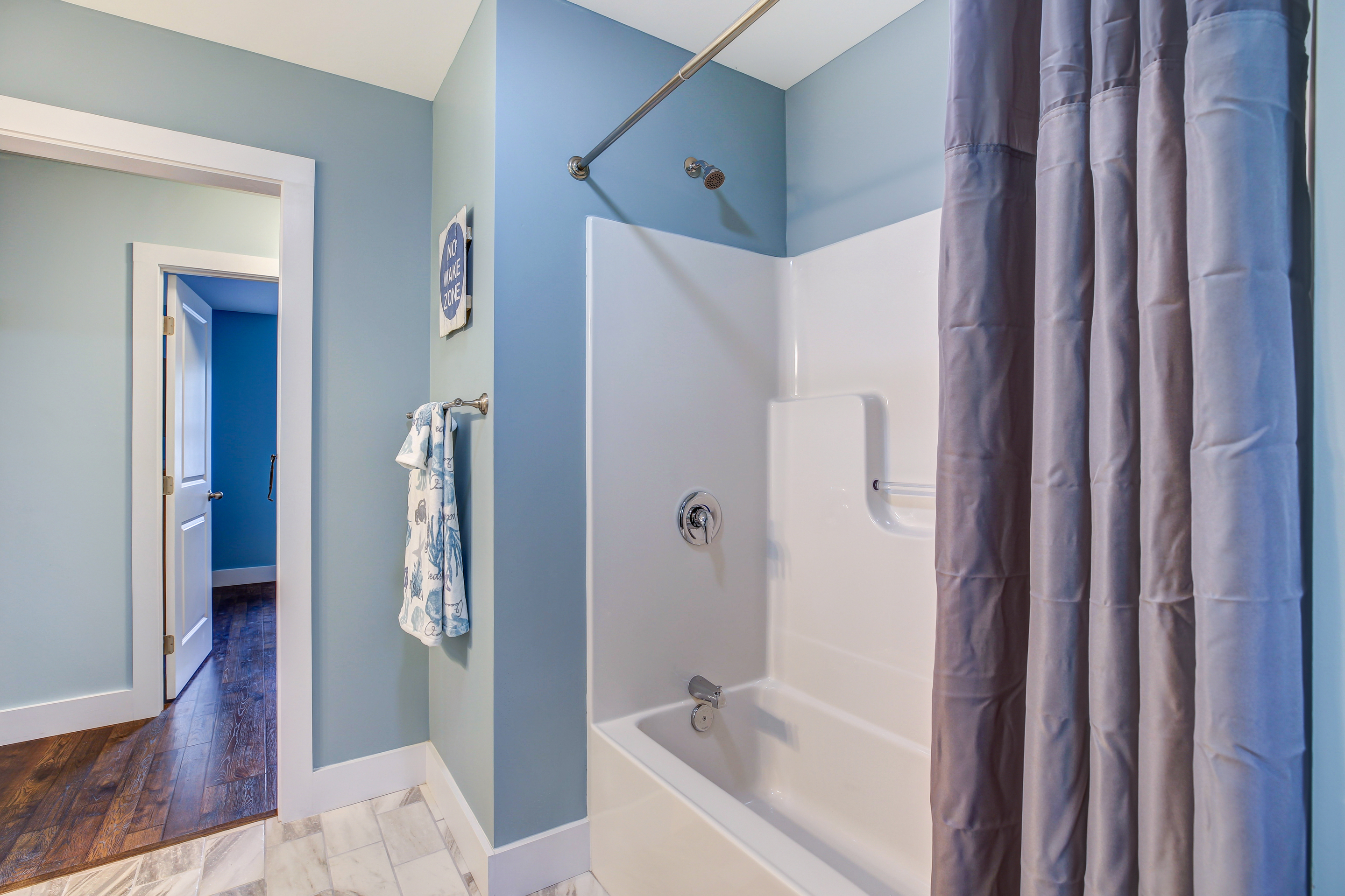 Full Bath 1 is just across the hall from the 1st Floor Bedroom.