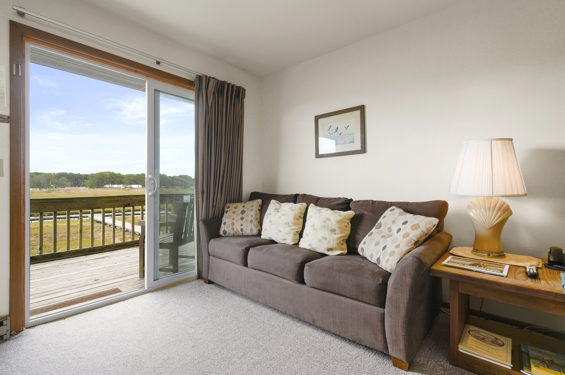 Lovely Creek Views right from your sofa - this is also a Sleeper Sofa.