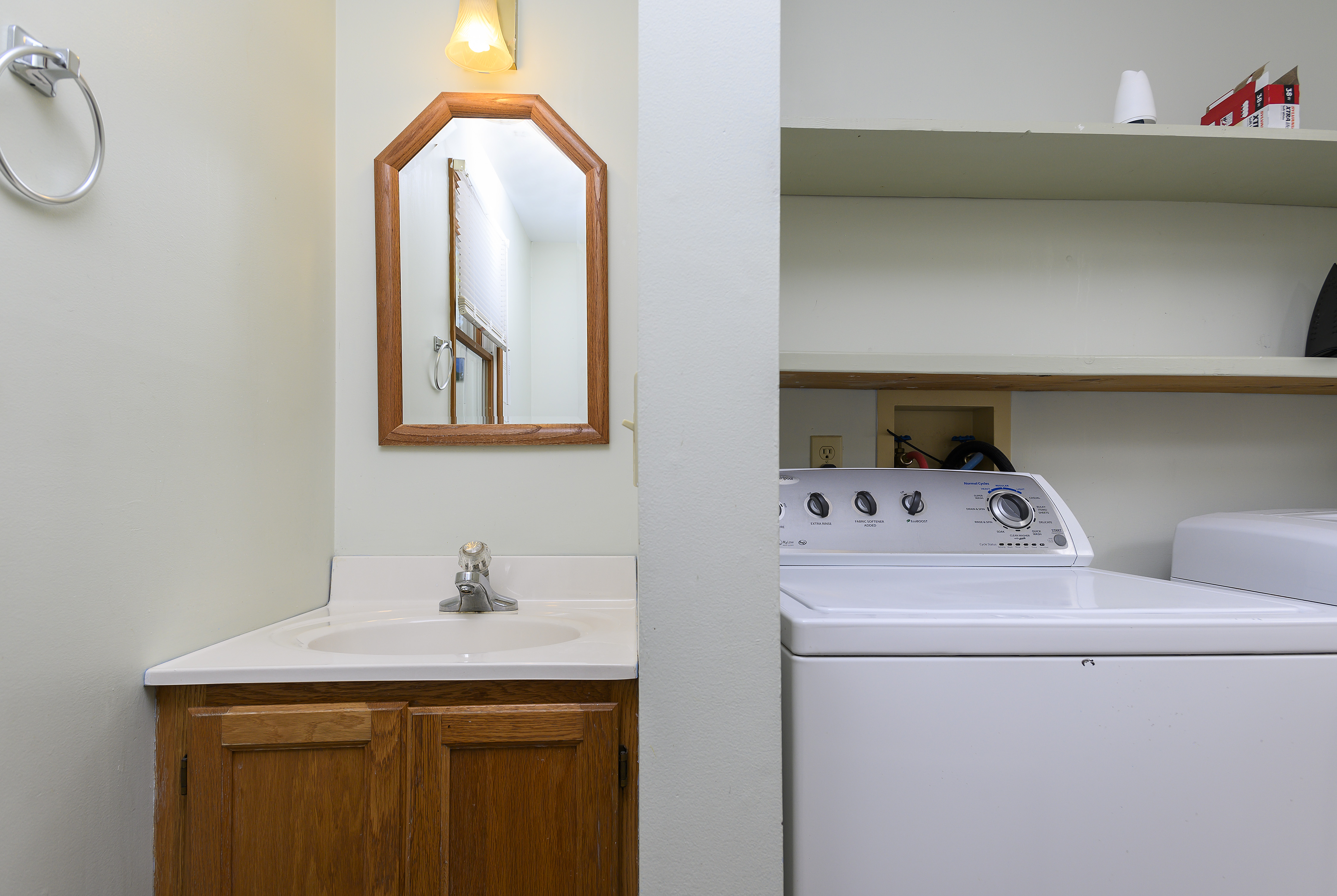 Downstairs Full Bath has Tub/Shower Combo and access to Laundry Area.