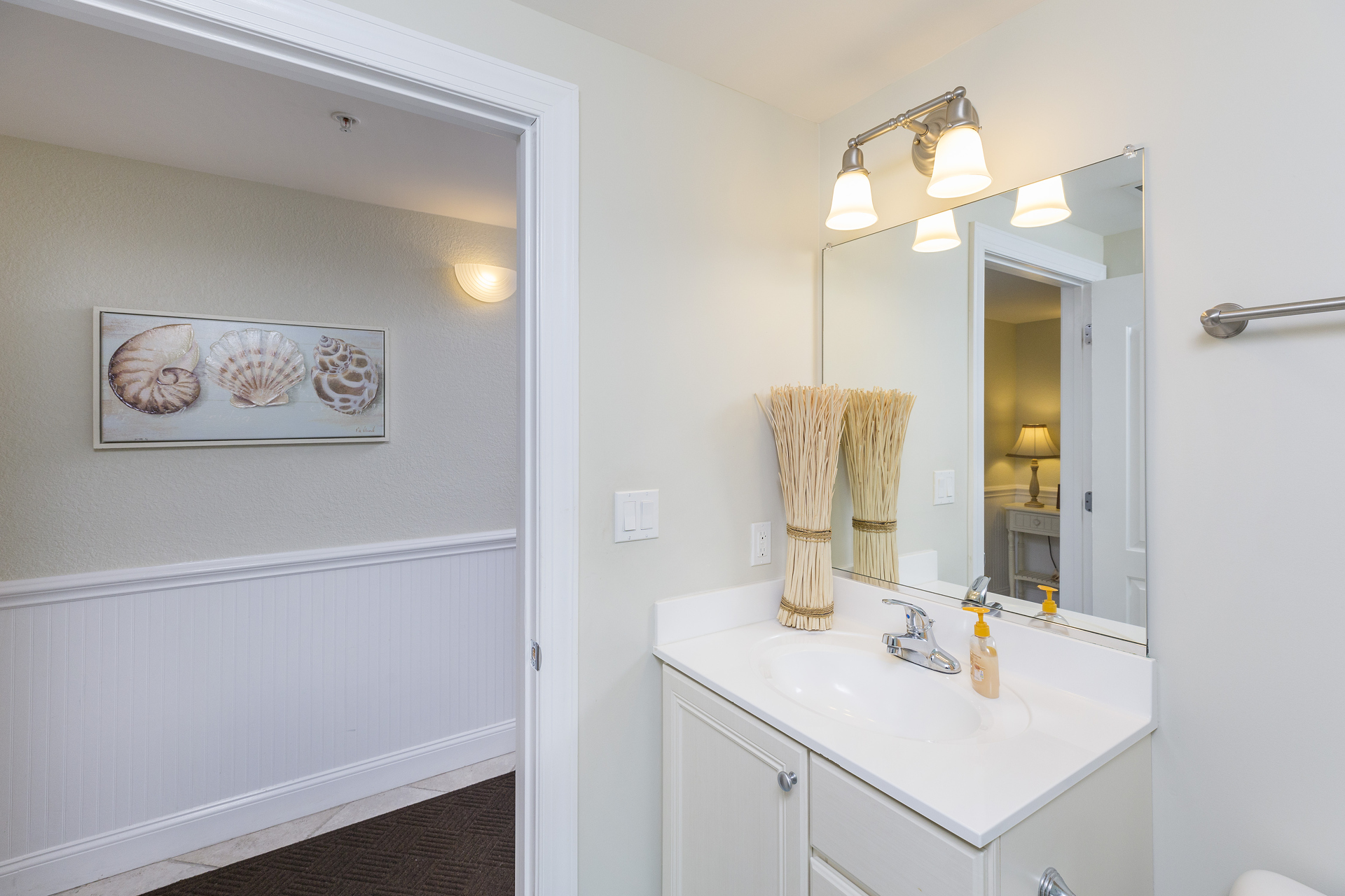 Convenient Half Bath is adjacent to Living Area.