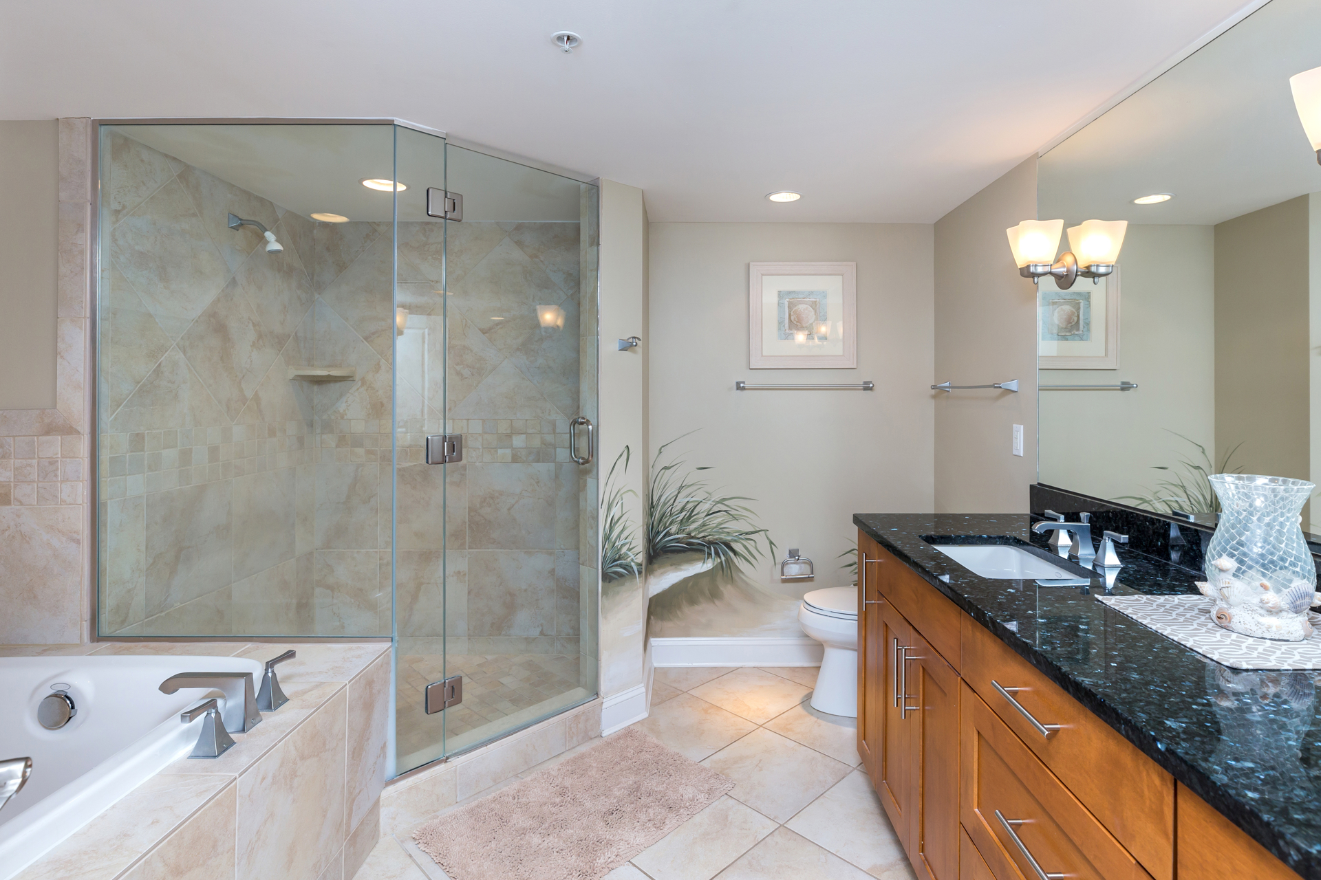 Huge Glass Shower with Custom Tile and breathtaking murals.