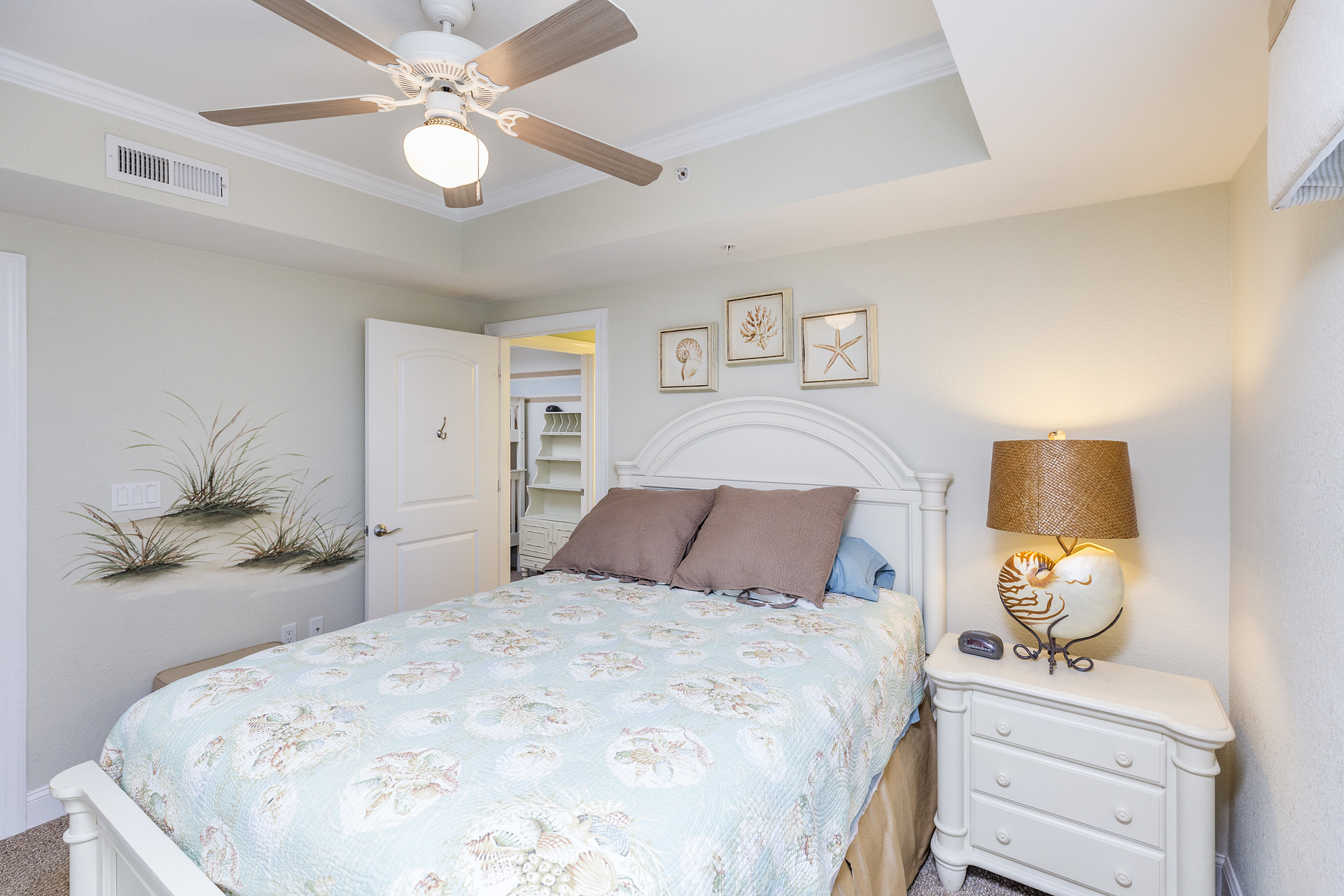 Gorgeous Bedroom 2 has Custom Coastal Mural and a Queen Bed.