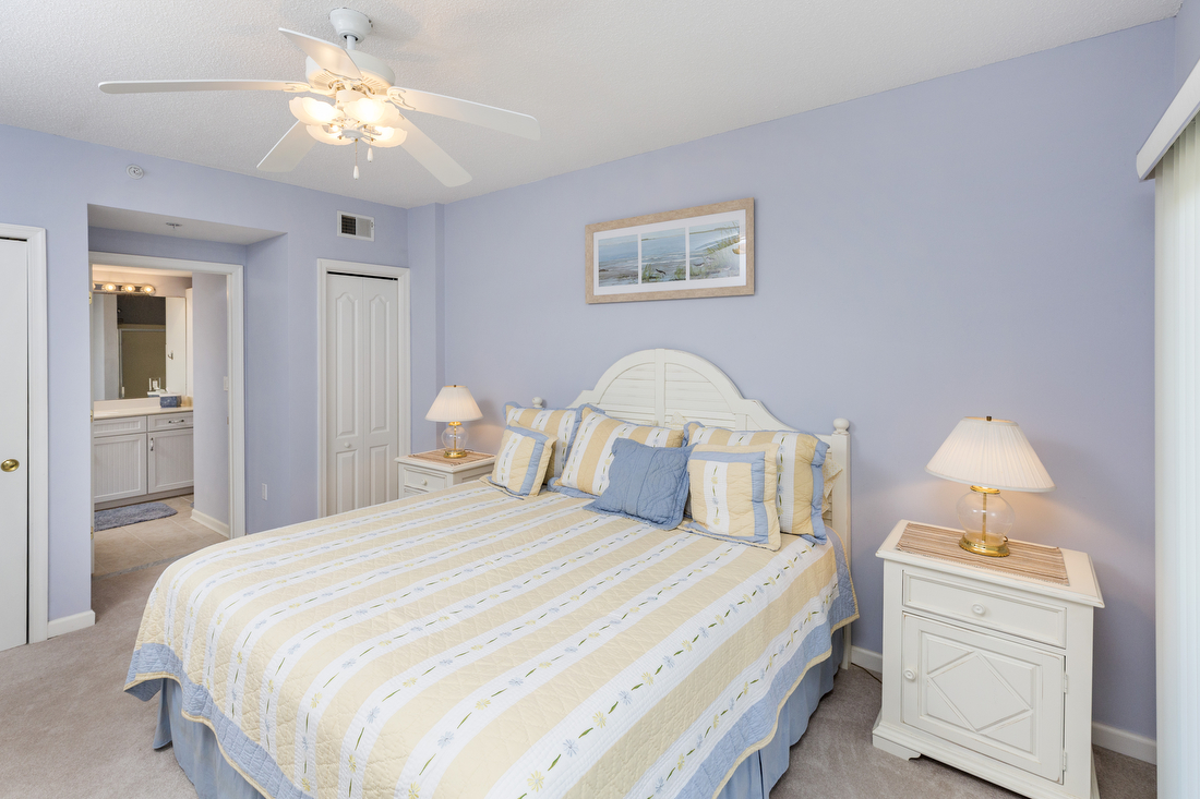 Primary Bedroom with King Bed and access to huge Balcony.