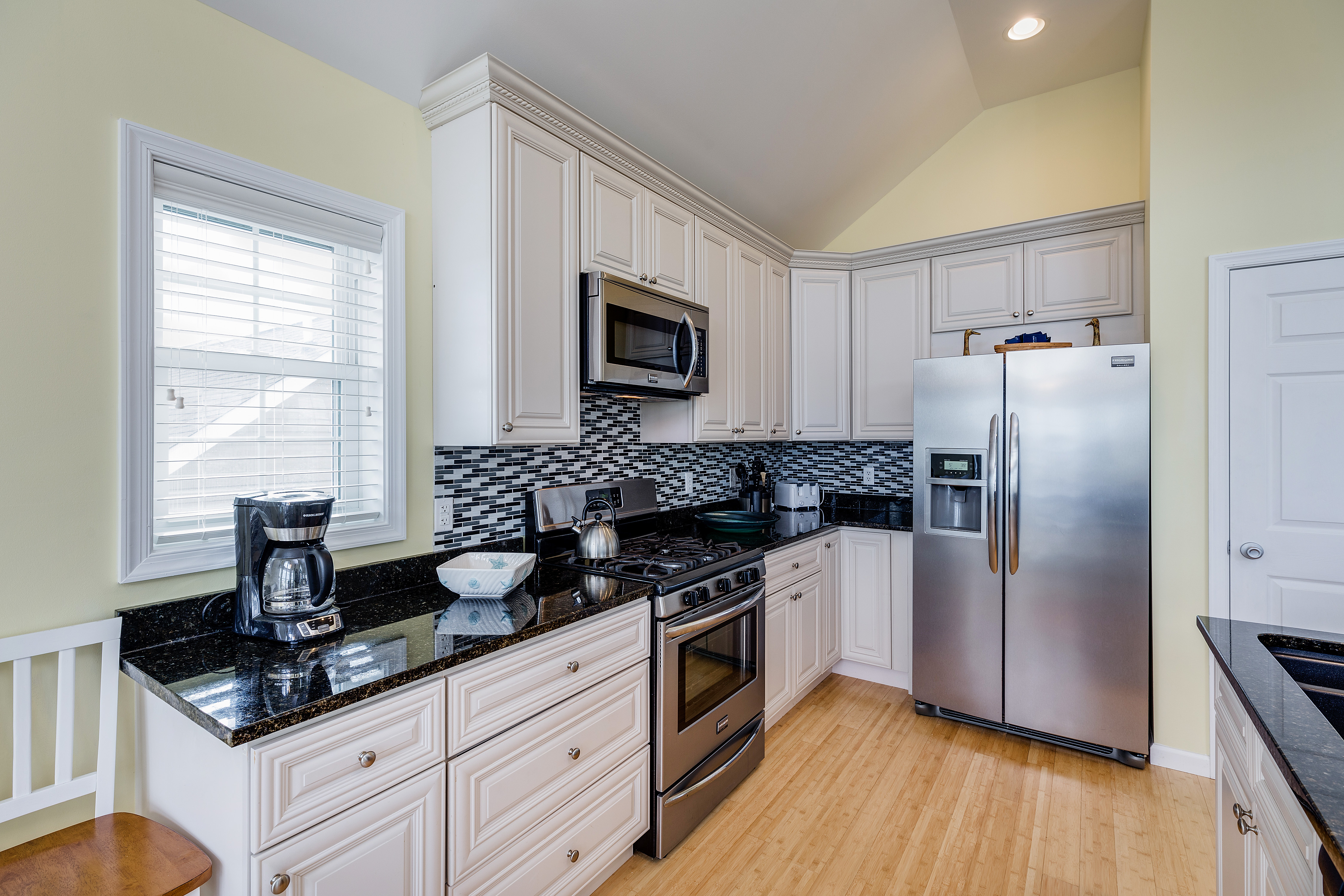 Enjoy Water Views as you prepare Family Meals in this gorgeous Kitchen.