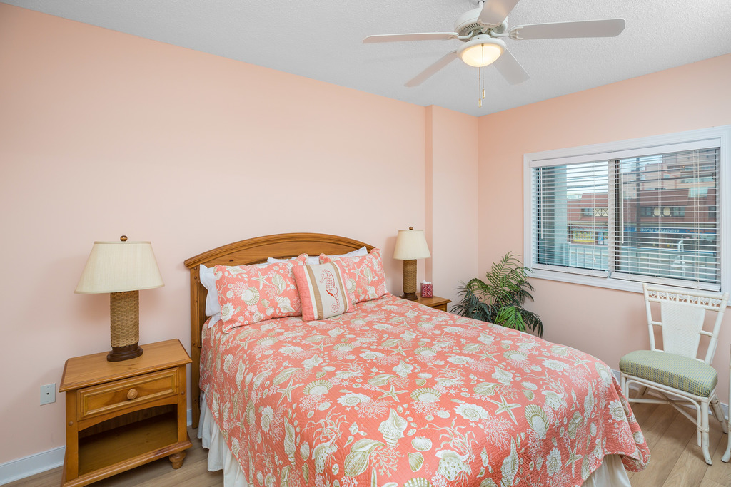 Bedroom 2 with Queen Bedroom and OC views.