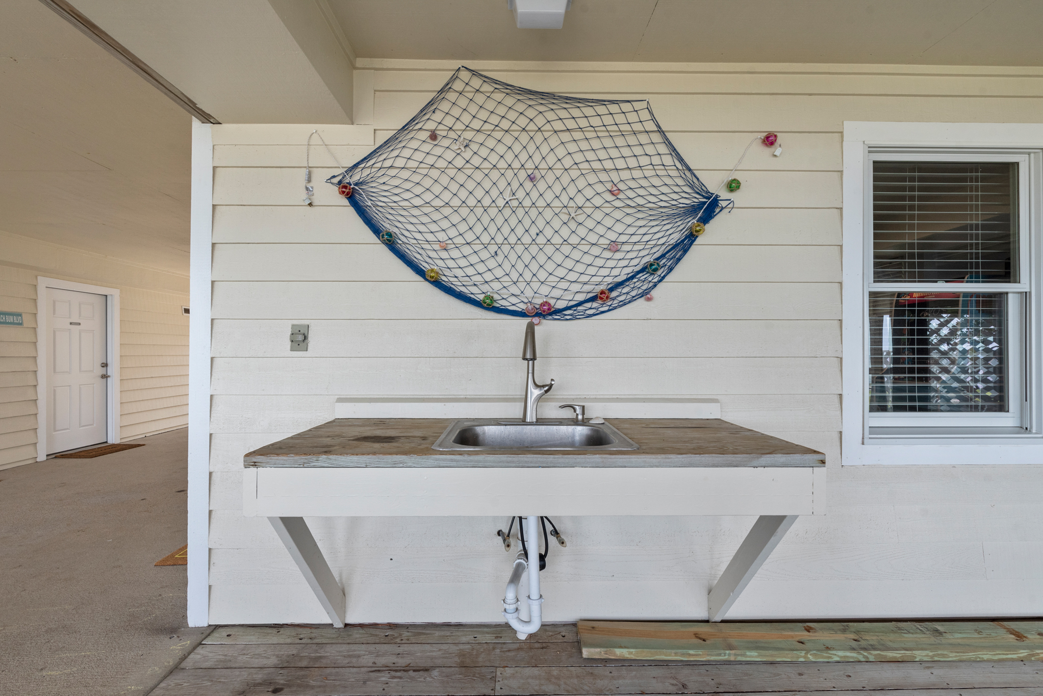 CL342: Spontaneity | Bottom Level Patio w/ Fish Cleaning Station