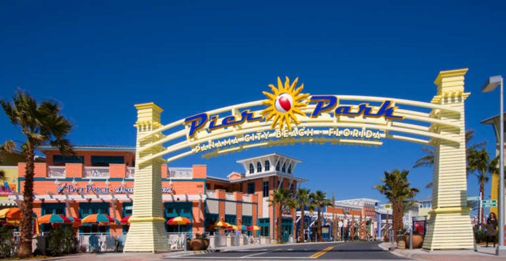 Pier Park entrance sign in Panama City Beach, Florida, marking a popular shopping and entertainment district near the property.