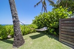 Relax in the shade and listen to the sound of the waves.