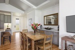 Share memorable meals in the dining space, seamlessly connected to the kitchen and living areas for easy entertaining.