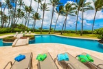 Unwind on your private pool deck surrounded by swaying palms