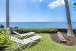 Lounge chairs just steps from the lanai invite you to relax with uninterrupted oceanfront views.