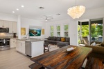 Bright, open-concept living space blends kitchen, dining, and lounging areas—ideal for gathering with friends and family.
