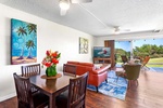 The open living area flows effortlessly to the lanai, making it easy to relax together after a day exploring the Kona Coast.