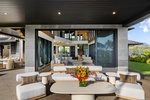Sip cocktails or share laughter with loved ones in the breezy covered outdoor lounge.