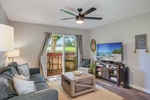 Living room offers views of lush golf course (2)