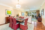 Share memorable island meals at the dining table with seating for six, seamlessly connected to the living area.