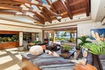 Gather beneath soaring open-beam ceilings where retractable walls blur the line between indoors and out.