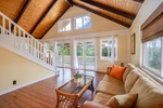 Gather with loved ones in the spacious living area filled with natural light and island charm.