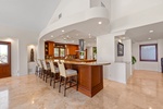 Settle into the expansive kitchen and dining area, perfect for slow mornings and shared meals.