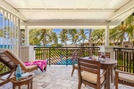 Lanai has views of the pool and distant ocean