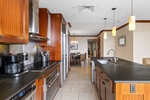 This fully equipped kitchen with stainless steel appliances will please any chef!