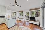 A fully equipped kitchen makes meal prep easy, with plenty of counter space and natural light.