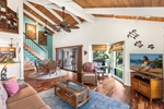 Cozy and open-concept living space with authentic Hawaiian décor and ocean views.
