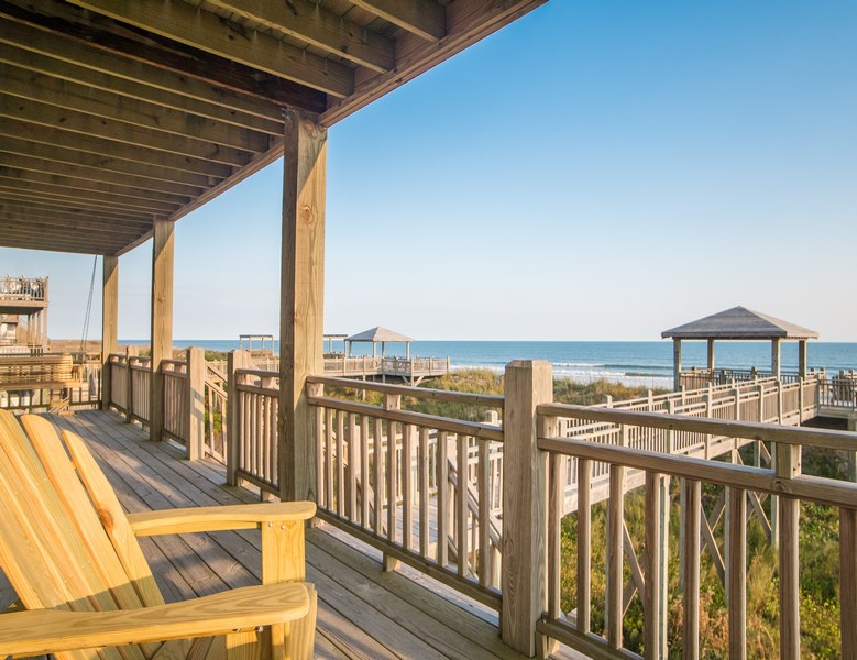 The covered oceanfront deck and private beach access