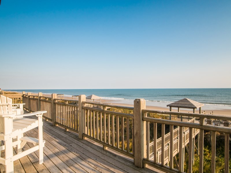 The top floor oceanfront deck and private beach access