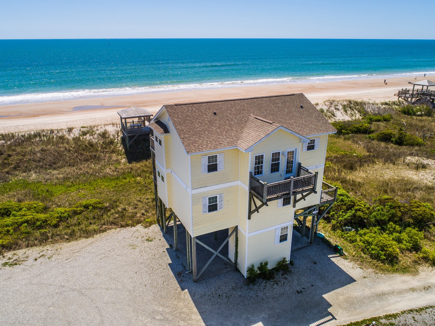 Aerial view of Fit To Be Tide, an oceanfront home with private beach access