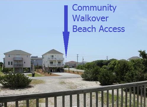 4 Dock Holliday streetside view of community beach access a